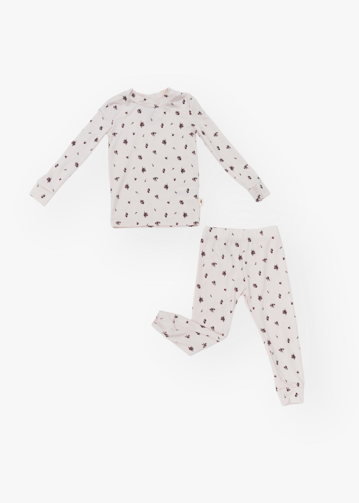 Milana Label kids long sleeve set in Birch Floral, a warm neutral fabric with a scattered dark floral print.