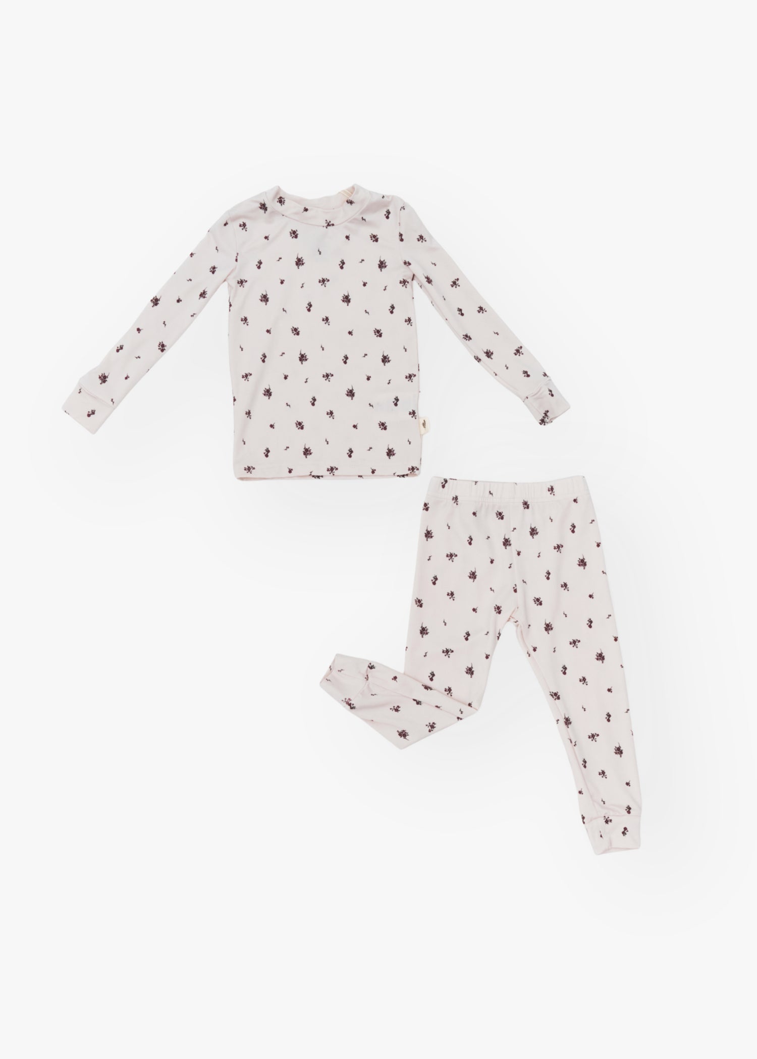 Milana Label kids long sleeve set in Birch Floral, a warm neutral fabric with a scattered dark floral print.