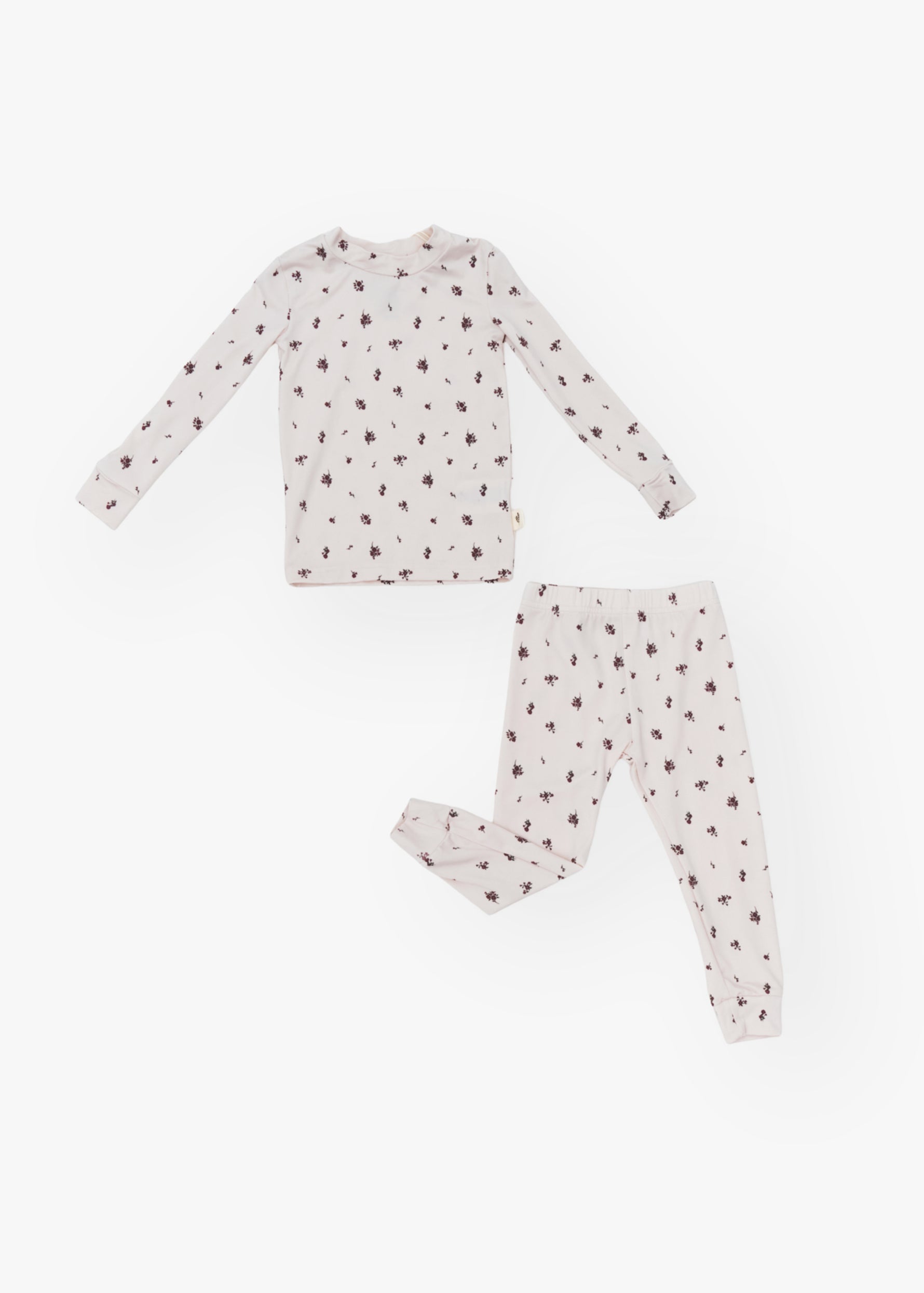 Milana Label kids long sleeve set in Birch Floral, a warm neutral fabric with a scattered dark floral print.