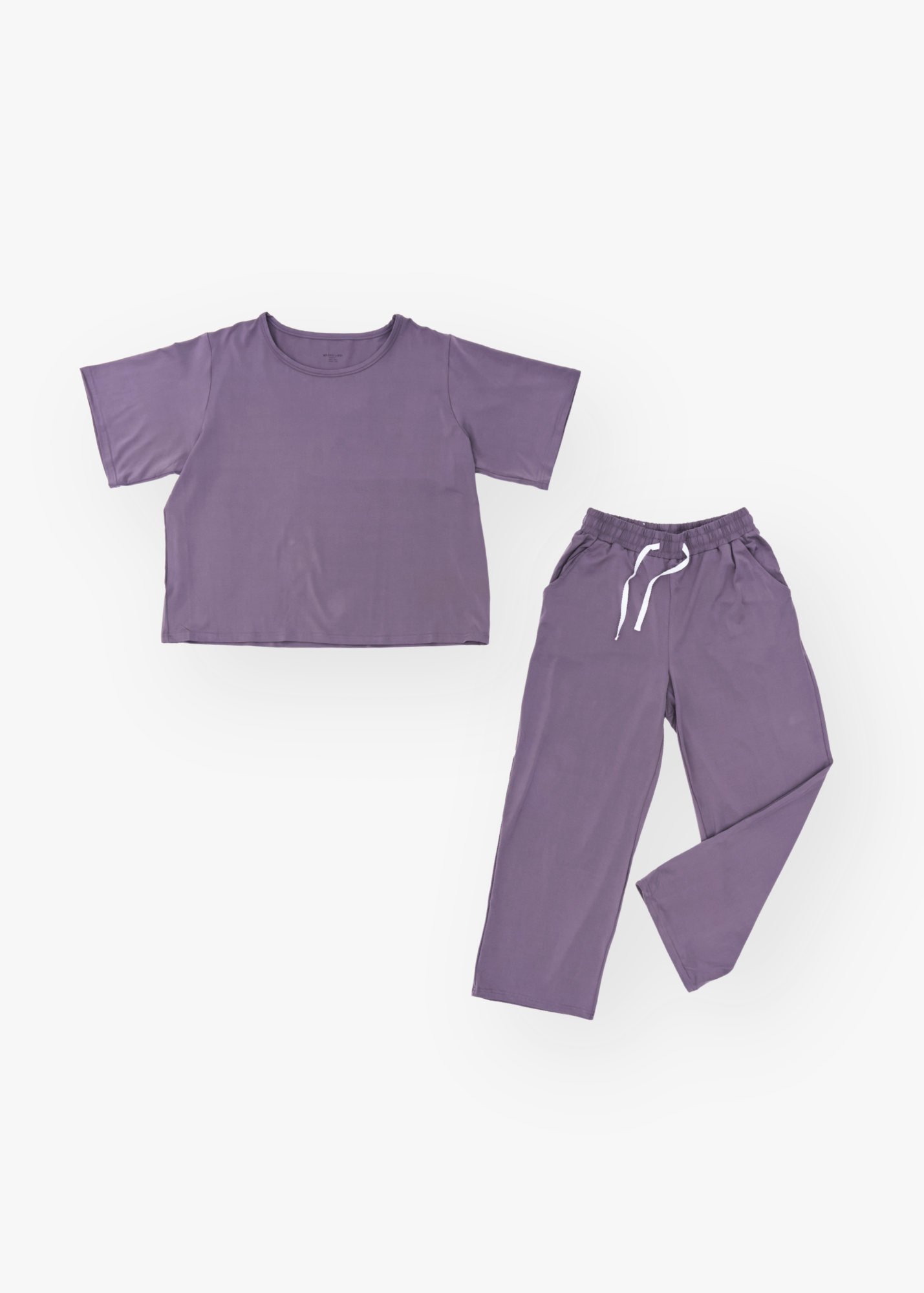 Milana Label women's short sleeve top and wide leg pant set in Wild Mulberry, a muted dusty purple tone.