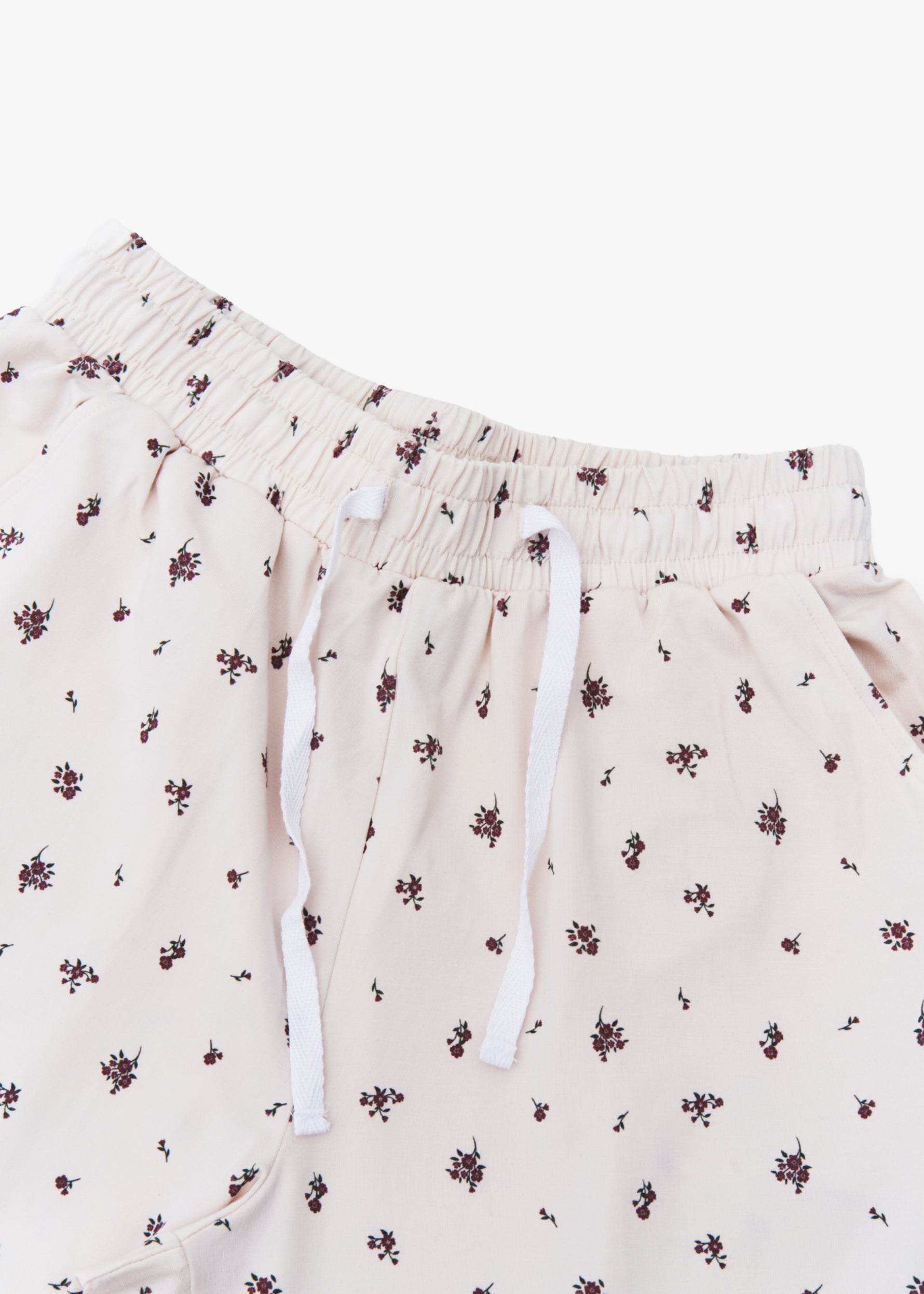 Milana Label women's lounge set in Birch Floral, a warm neutral tone, photographed flat against a white background.