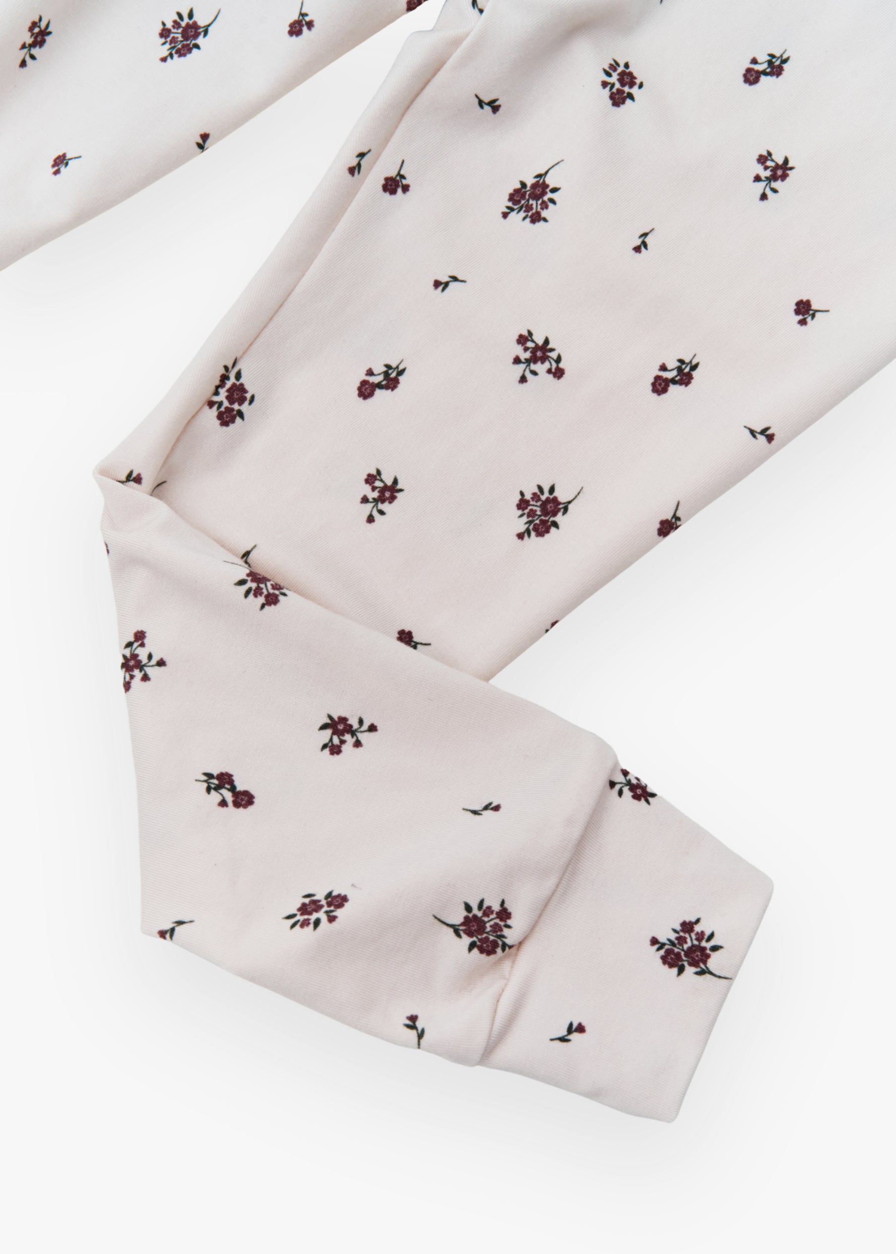 Milana Label kids long sleeve set in Birch Floral, a warm neutral fabric with a scattered dark floral print.