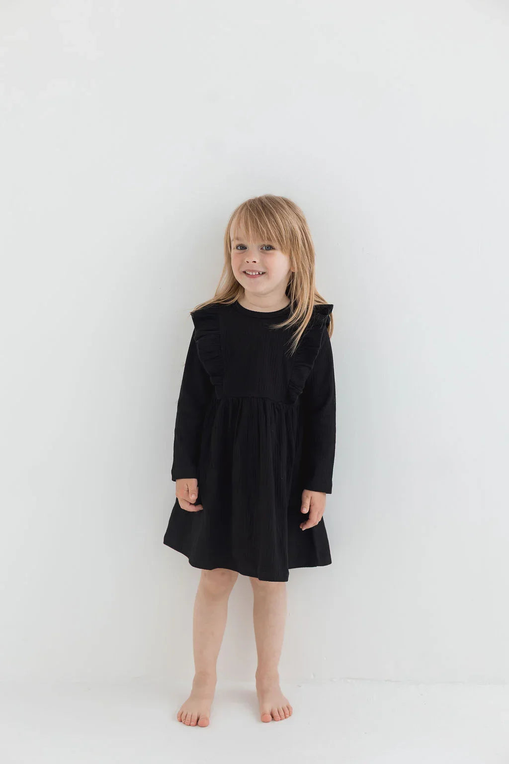 Ribbed Flutter Dress | Black - Mila & Co.