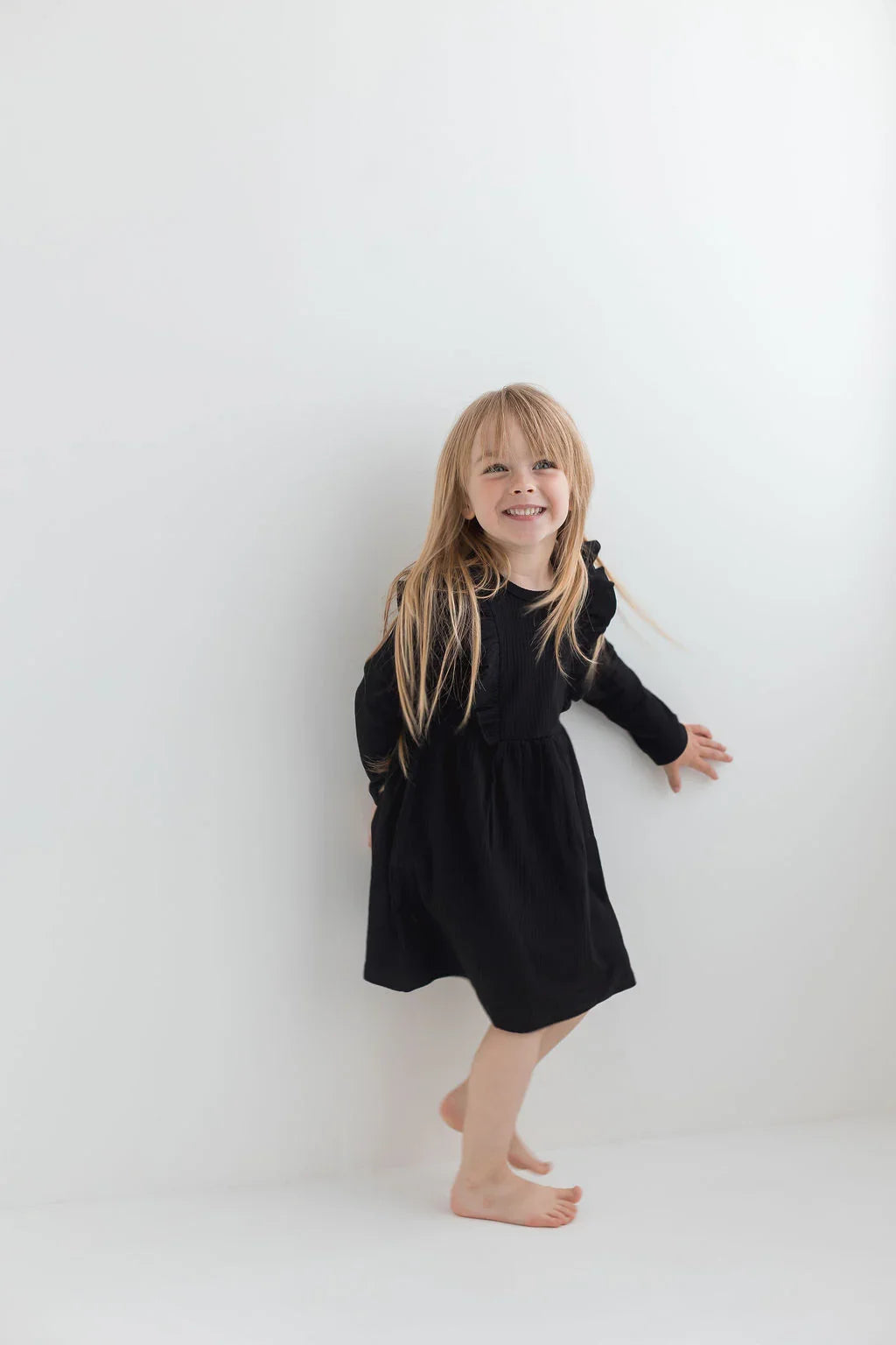 Ribbed Flutter Dress | Black - Mila & Co.