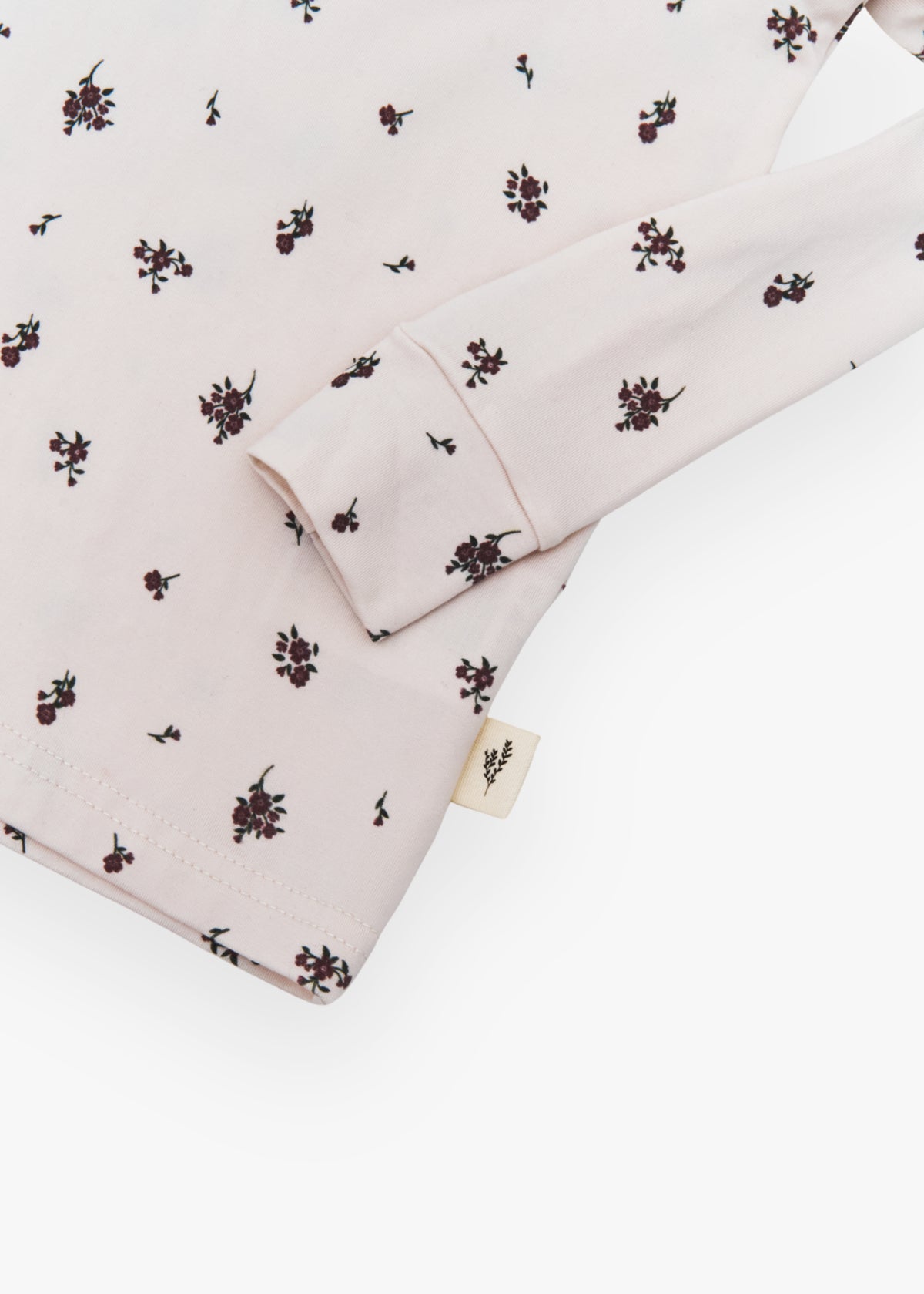 Milana Label kids long sleeve set in Birch Floral, a warm neutral fabric with a scattered dark floral print.