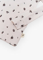 Milana Label kids long sleeve set in Birch Floral, a warm neutral fabric with a scattered dark floral print.
