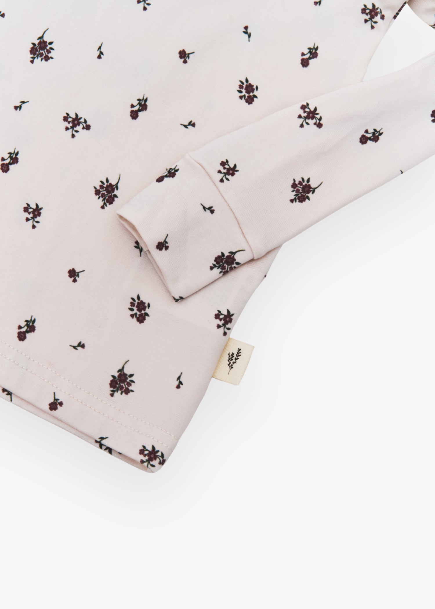 Milana Label kids long sleeve set in Birch Floral, a warm neutral fabric with a scattered dark floral print.