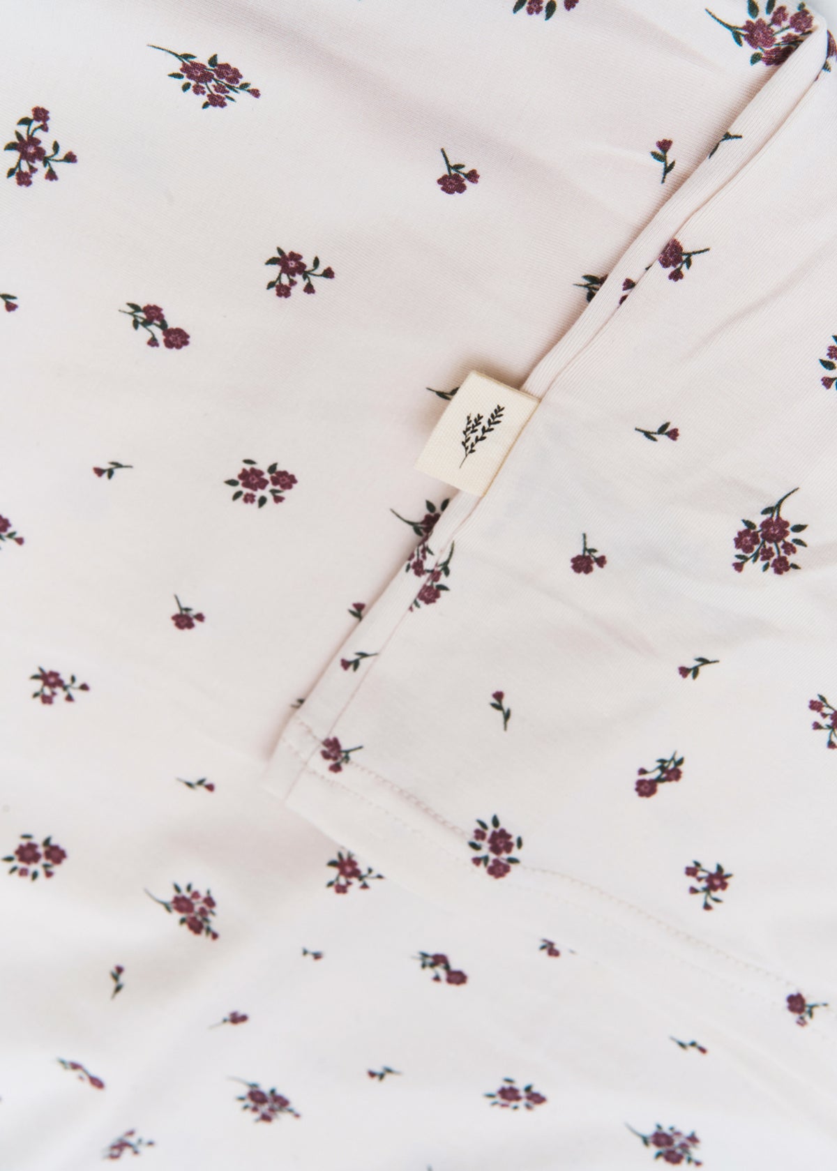 Milana Label women's lounge set in Birch Floral, a warm neutral tone, photographed flat against a white background.