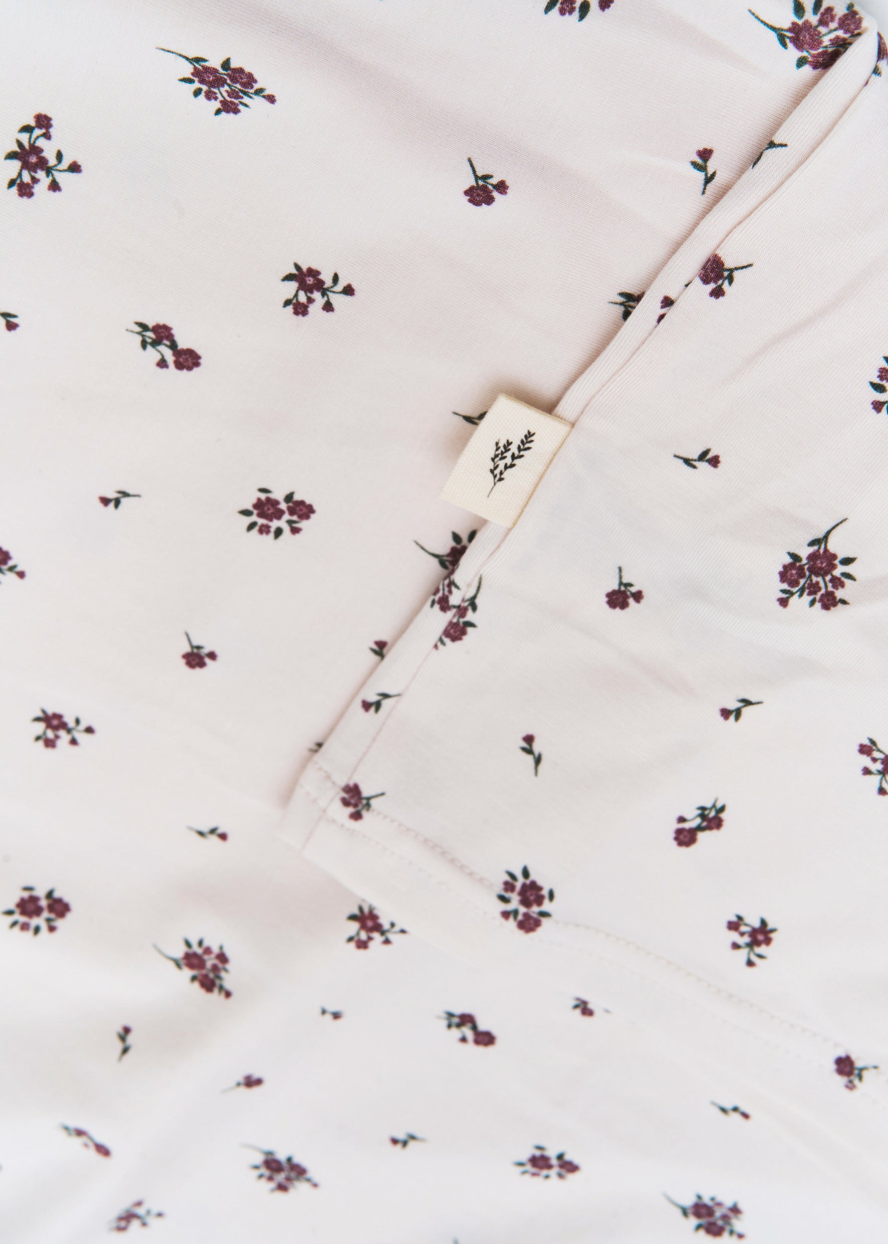 Milana Label women's lounge set in Birch Floral, a warm neutral tone, photographed flat against a white background.