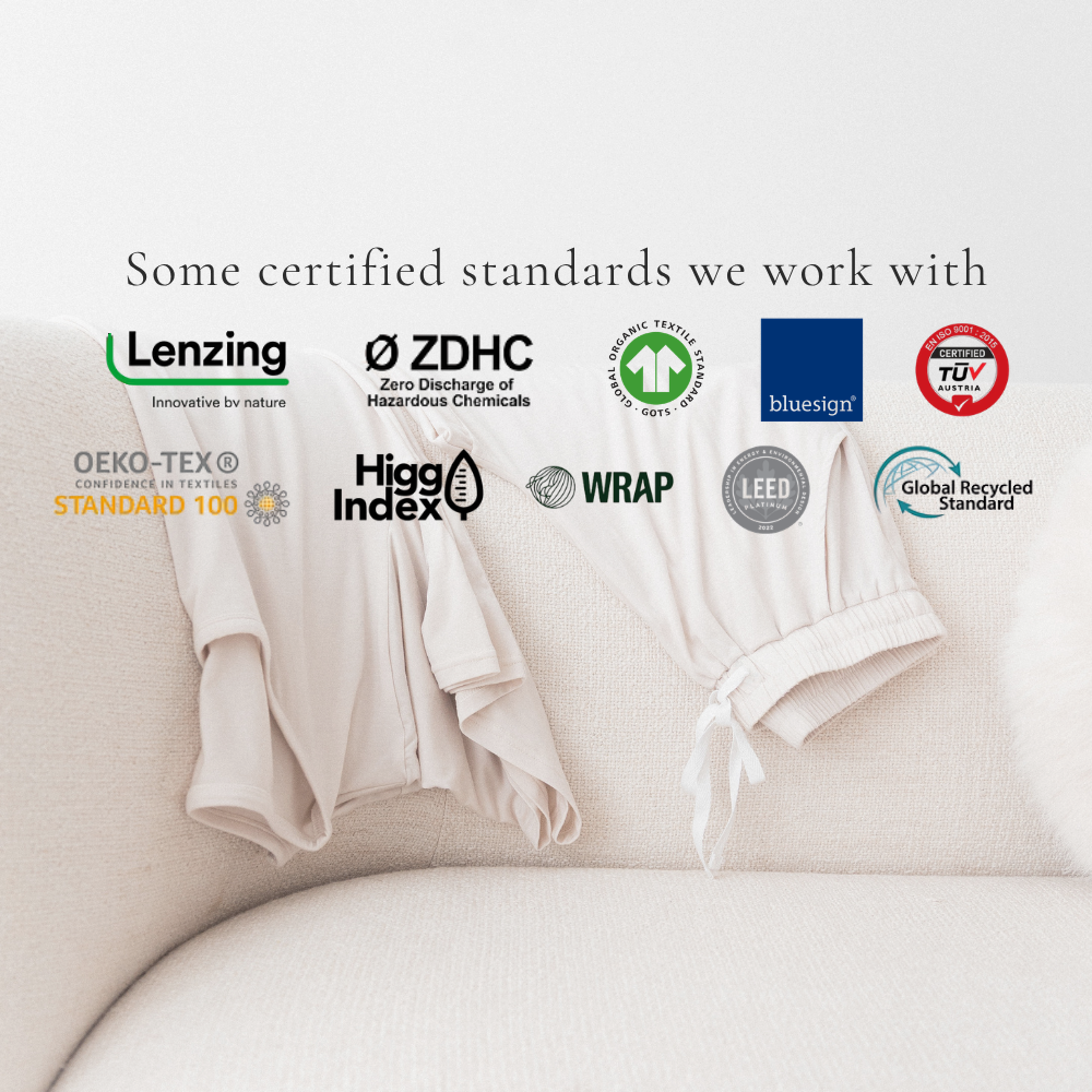 Milana Label outfit on a white couch with sustainability certification logos displayed.