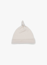 Milana Label Baby Knot Hat in the colour Birch on an off-white background.