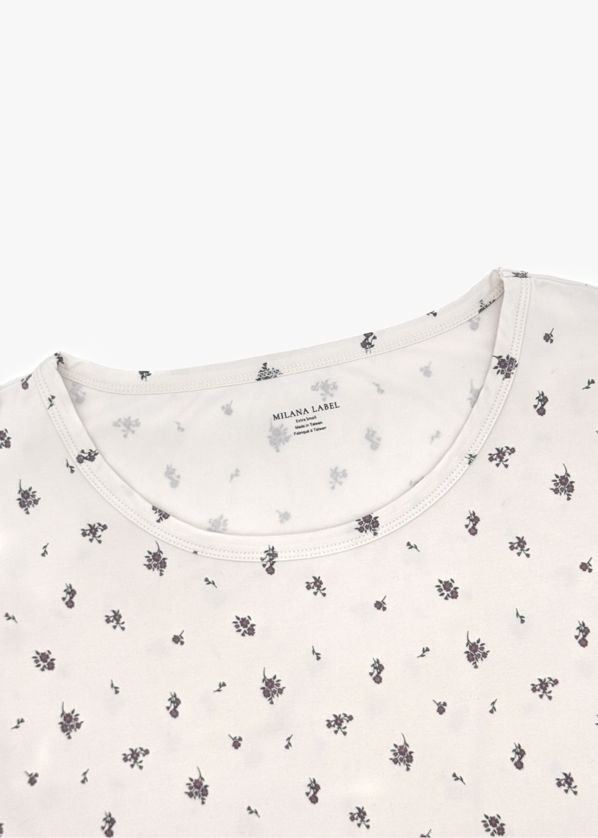 Milana Label Women's Lounge Set in the colour Birch Floral on an off-white background. Highlighting the neckline.