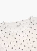 Milana Label Women's Lounge Set in the colour Birch Floral on an off-white background. Highlighting the neckline.