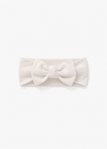 Milana Label baby bow headband in Birch, a warm neutral tone, photographed flat against a white background.