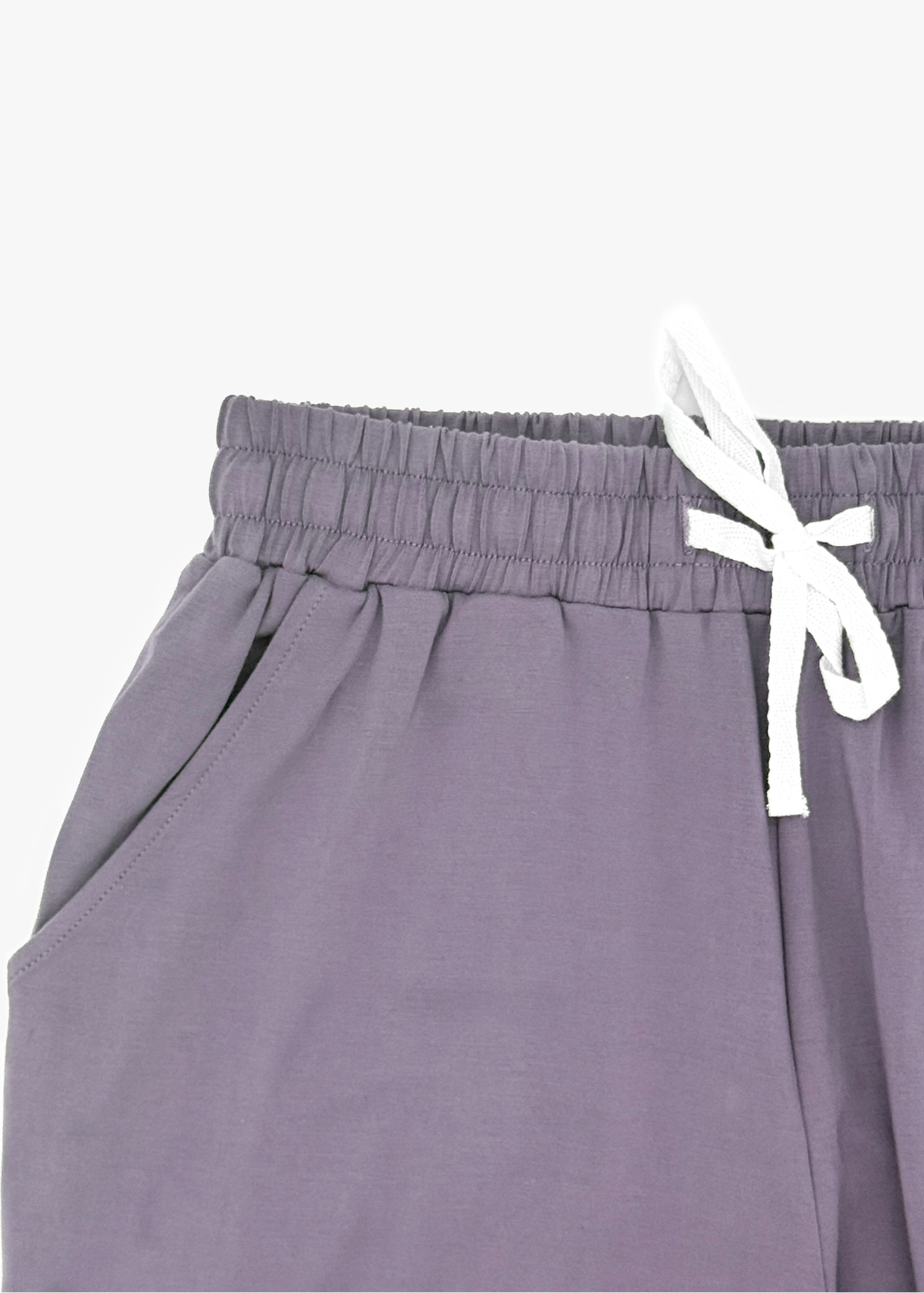 Milana Label Women's Lounge Set in the colour Wild Mulberry on an off-white background. Highlighting the pockets and waistband.