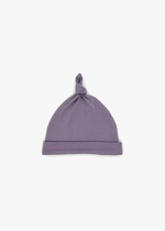 Milana Label Baby Knot Hat in the colour Wild Mulberry on an off-white background.