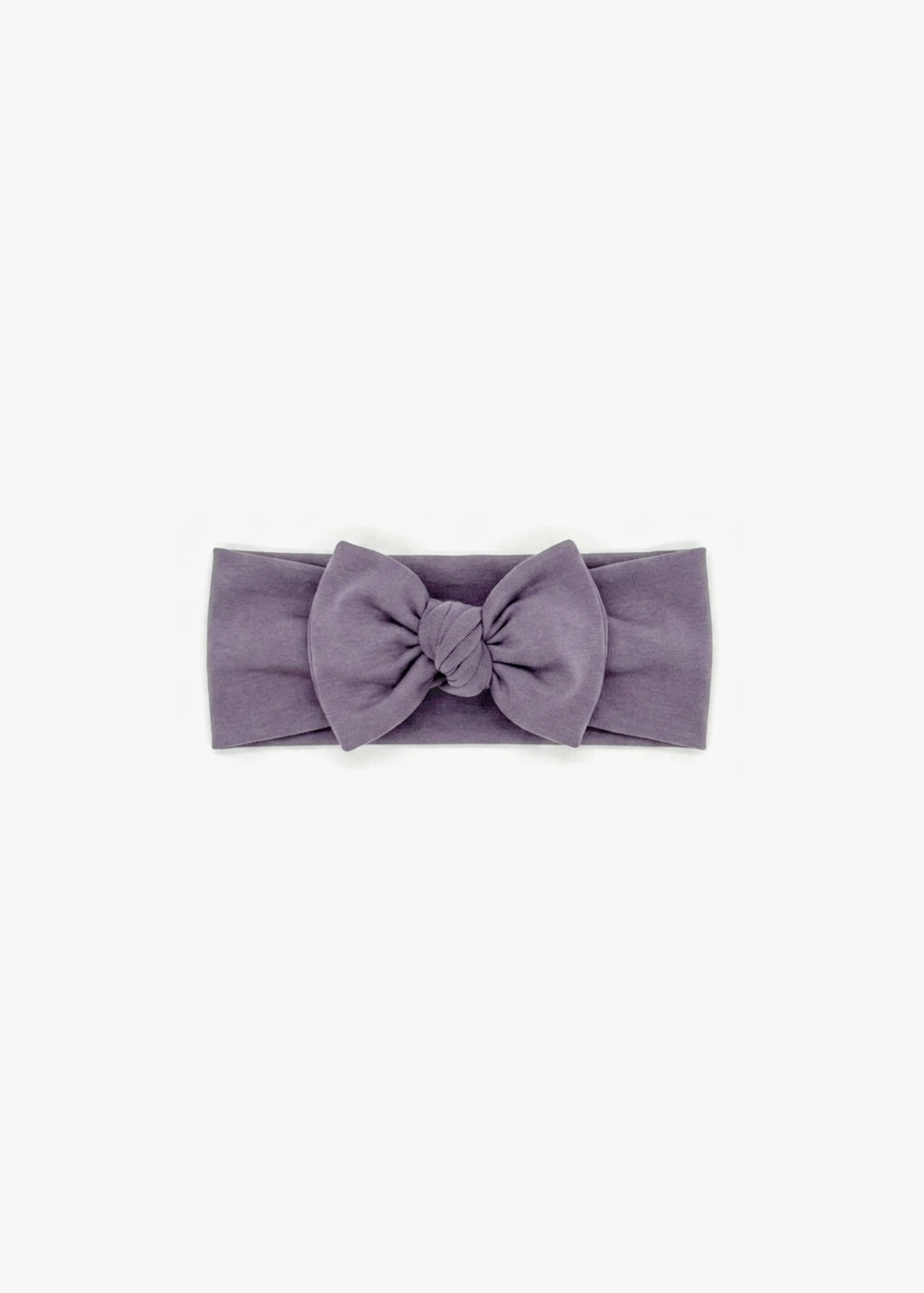 Milana Label Knot Headband in the colour Wild Mulberry on an off-white background.
