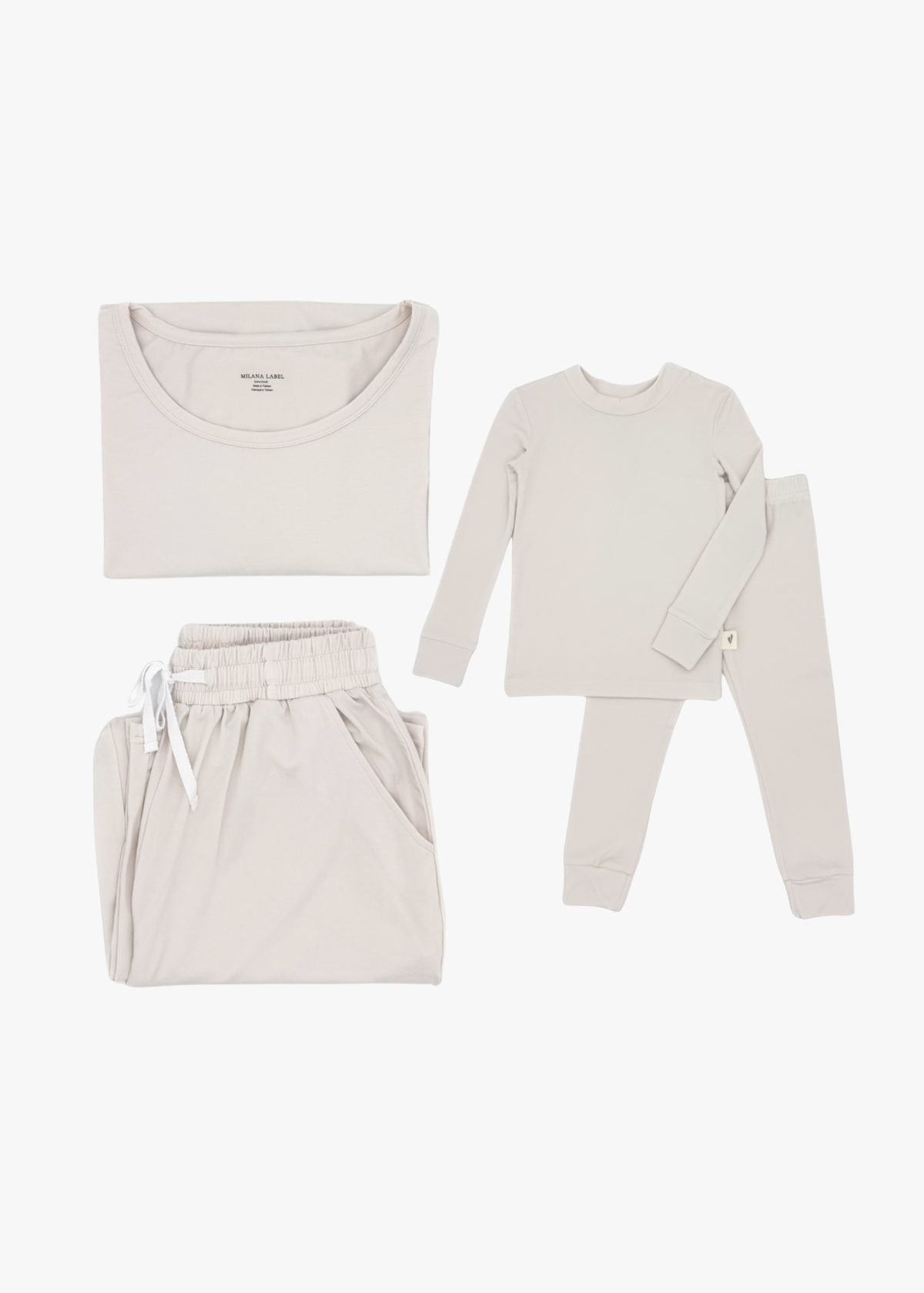 Milana Label mommy and me matching pajama bundle, adult and kids Milana Soft™ TENCEL™ pyjama sets laid flat side by side.