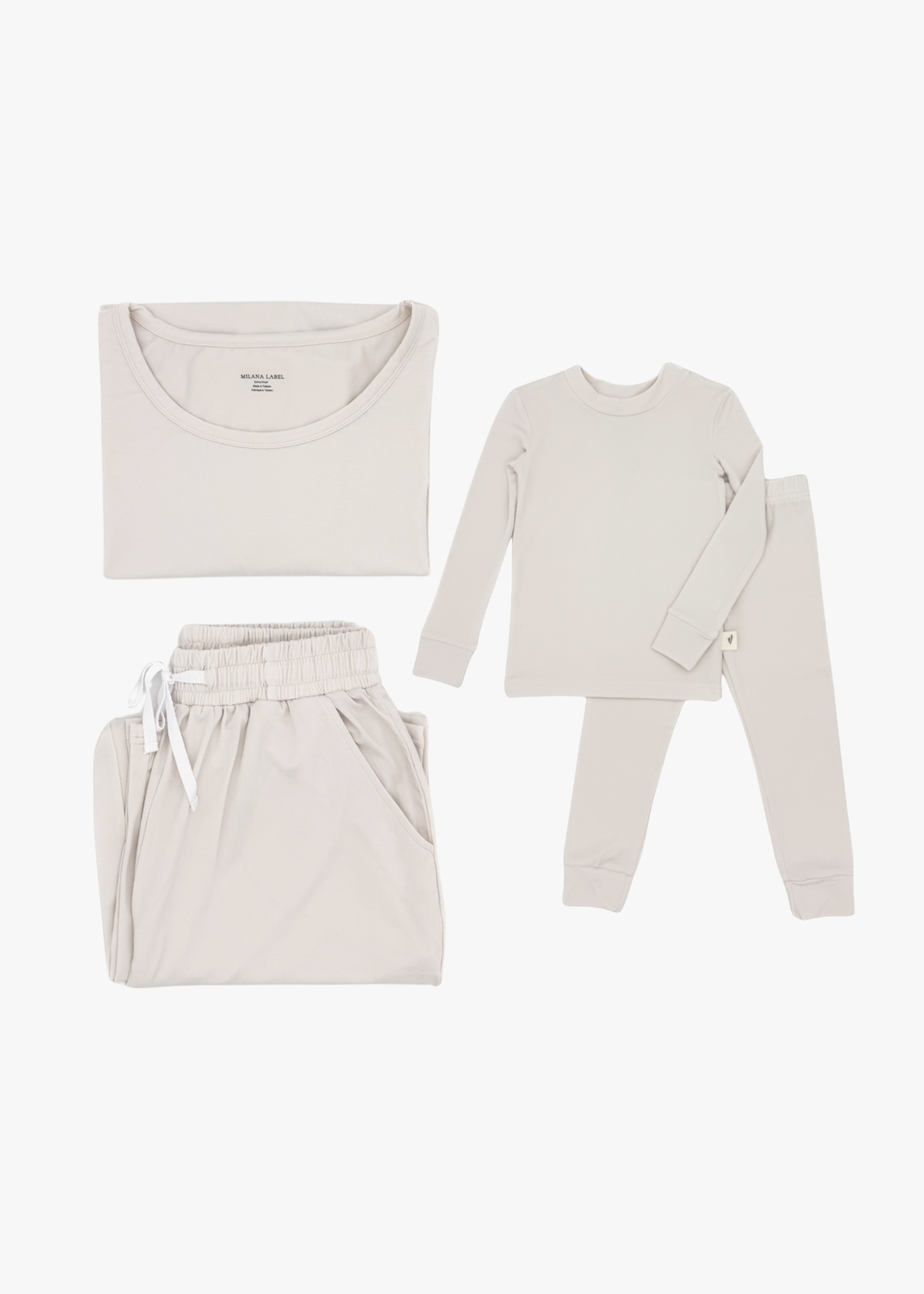Milana Label mommy and me matching pajama bundle, adult and kids Milana Soft™ TENCEL™ pyjama sets laid flat side by side.