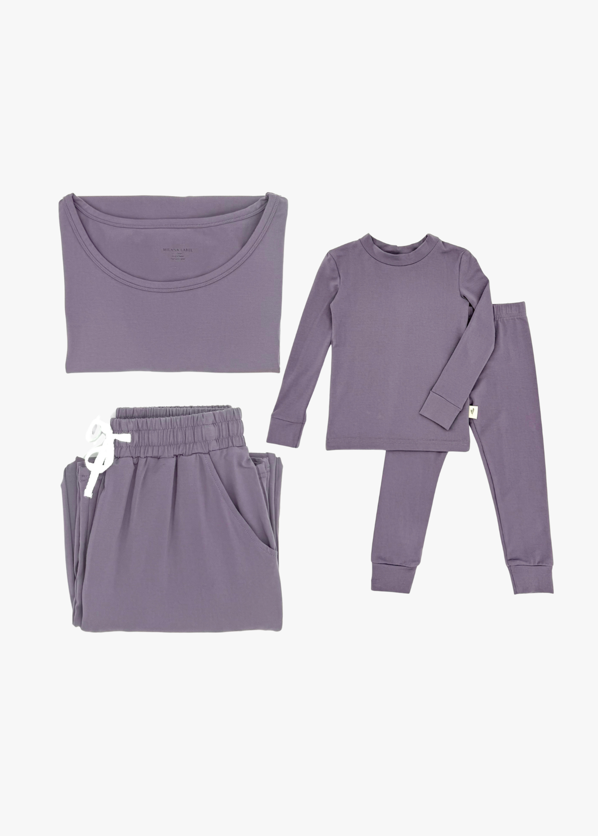 Milana Label mommy and me matching pajama bundle, adult and kids Milana Soft™ TENCEL™ pyjama sets laid flat side by side.