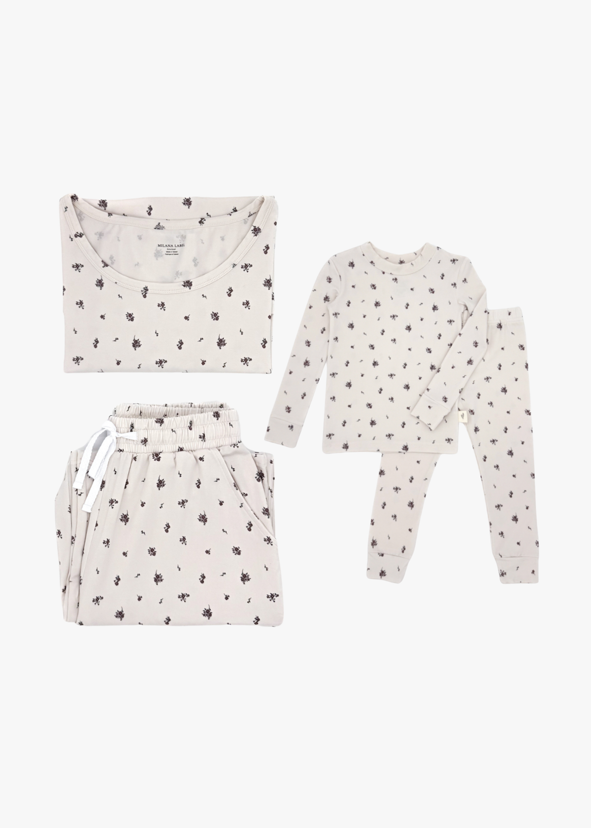 Milana Label mommy and me matching pajama bundle, adult and kids Milana Soft™ TENCEL™ pyjama sets laid flat side by side.