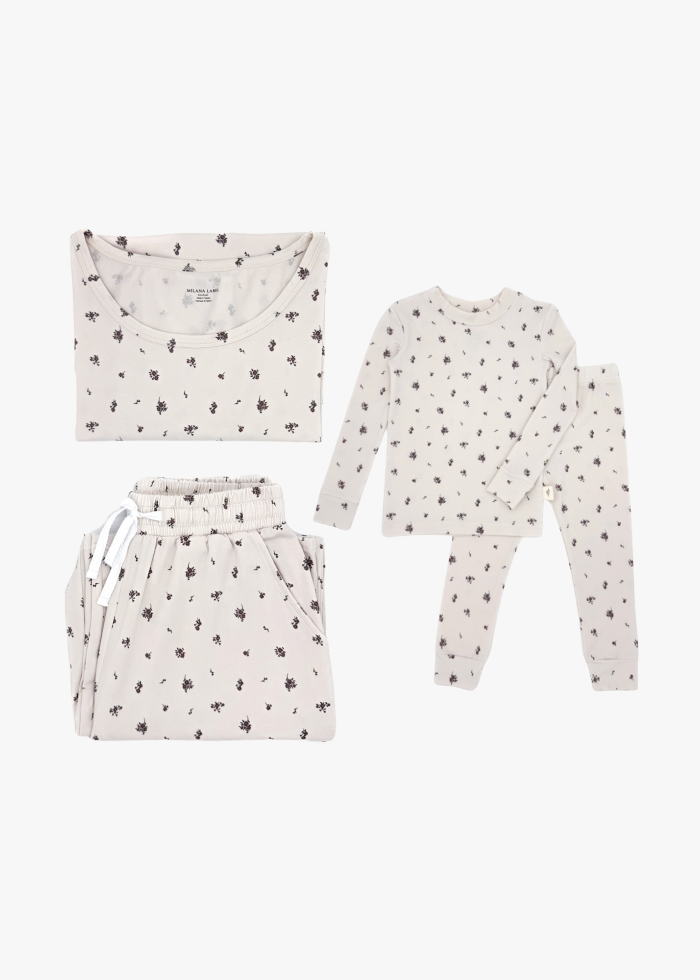 Milana Label mommy and me matching pajama bundle, adult and kids Milana Soft™ TENCEL™ pyjama sets laid flat side by side.