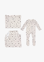 Milana Label mommy and me sleeper bundle in Birch, adult two-piece lounge set and baby zip footie sleeper laid flat together.