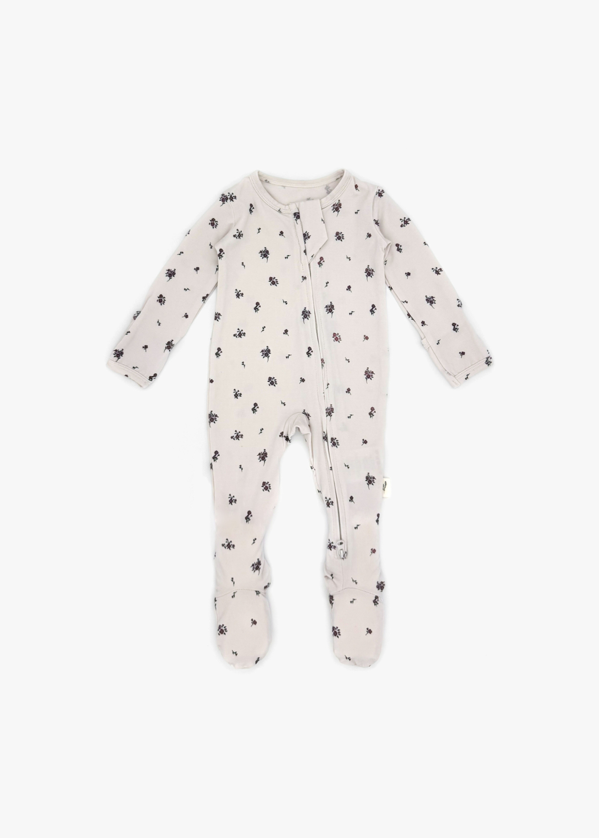 Milana Label Zippered Sleeper in the colour Birch Floral  on an off white background.