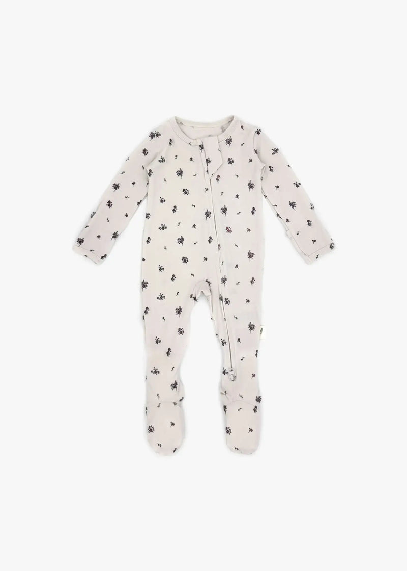 Milana Label Zippered Sleeper in the colour Birch Floral  on an off white background.