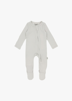 Milana Label organic cotton ribbed baby footie sleeper PJ in Stone greige, displayed flat against a clean white background.