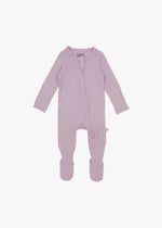 A flat lay of a ribbed zippered sleeper in the colour Lavender Blush by Milana Label.