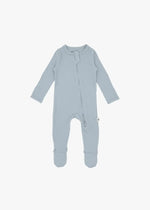 A flat lay of a ribbed zippered sleeper in the colour Soft Slate by Milana Label.