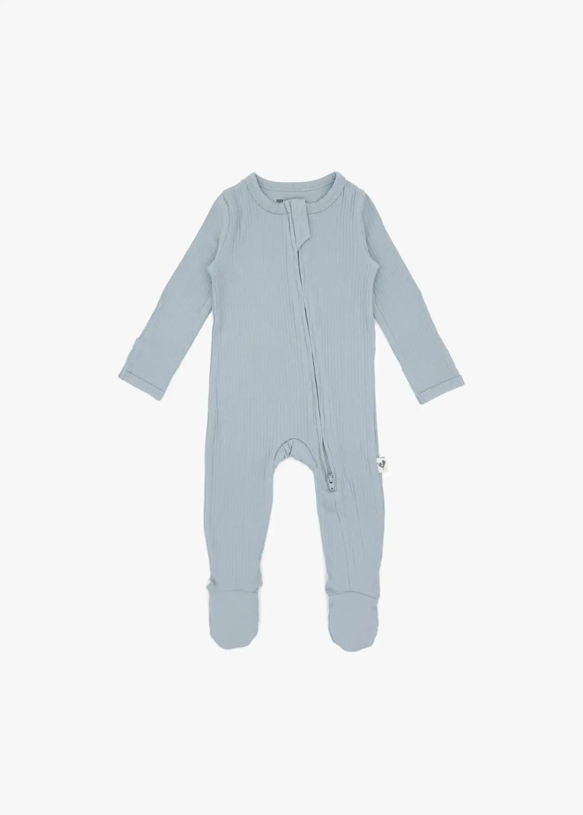 A flat lay of a ribbed zippered sleeper in the colour Soft Slate by Milana Label.