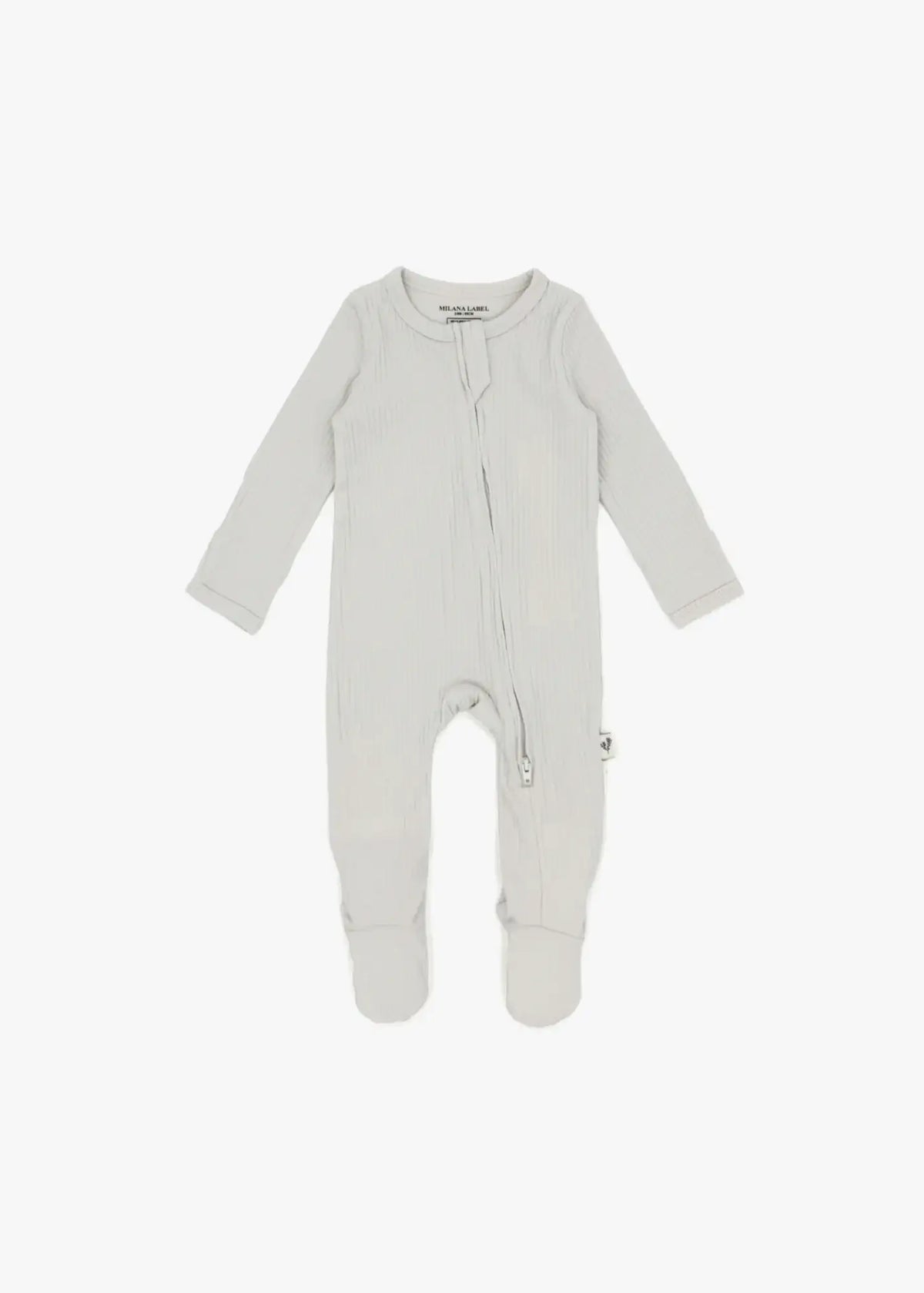 A flat lay of a ribbed zippered sleeper in the colour Stone by Milana Label.